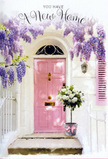 This doorway scene feels as if it were lifted from a quiet corner of Hampton Hill, the kind of place where neighbours notice new door colours and fresh flowers with genuine delight. At the heart is a beautifully painted pink front door, its shade a soft, chalky blush that radiates gentle warmth. Light glances off its panels, creating faint highlights that suggest a mild, sunlit day. The surrounding walls are whitewashed, their surface softly textured, and a single shutter painted in the same pink hue adds balance and charm. Framing the door from above, cascades of wisteria tumble down, their blossoms clustered in generous strings of lavender and pale violet. They hang in graceful arcs along the sides of the entrance, some strands brushing close to the top of the door, their imagined fragrance mixing with the coolness of the shaded step. At the threshold rests a simple yet elegant metal bucket in soft grey, placed squarely as a floral welcome. It overflows with luscious white and creamy roses, each bloom full and rounded, with velvety petals gently unfurling. Threads of muted green foliage weave among the roses, providing contrast and a natural, garden-fresh feel, as if they were just gathered from a local Hampton Hill garden. Around the base of the bucket is a delicate pink ribbon, tied in a neat bow whose satin sheen picks up and reflects the soft tones throughout the scene. The composition conveys the quiet thrill of a new beginning-perfect for congratulating someone on their first home near Hampton Hill Common or Park Road. Everything in the image, from the tumbling wisteria to the plush roses and welcoming door, whispers the same message: step inside, settle in, and let this new chapter unfold in beauty.